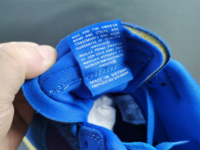 undefeated’s “dunk vs. af-1” collection grows with this snakeskin-dressed   dh6508-400