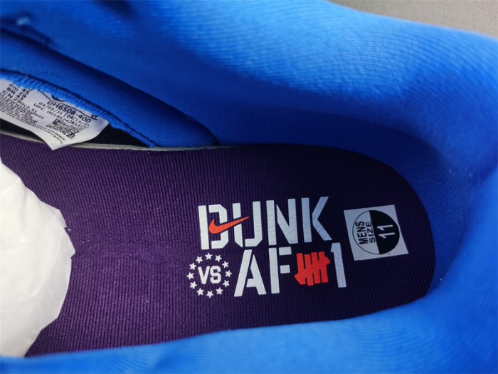 undefeated’s “dunk vs. af-1” collection grows with this snakeskin-dressed   dh6508-400